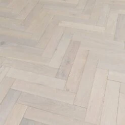 Liberty Floors Ivory White Oak - Herringbone Parquet 14mm Engineered Real Wood Flooring (219387) -Flooring Home Shop ivory white oak herringbone parquet 14mm engineered real wood flooring 219387 p85835 201397 image